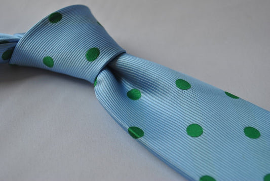 light blue tie with green polka dots