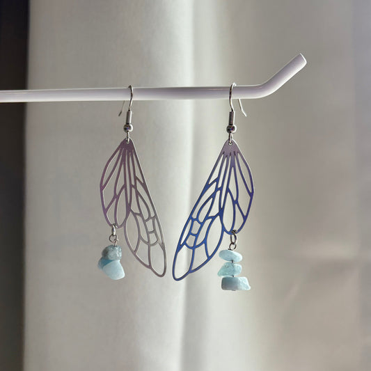 Stainless steel silver fairy wing dangle earrings with blue aquamarine crystals