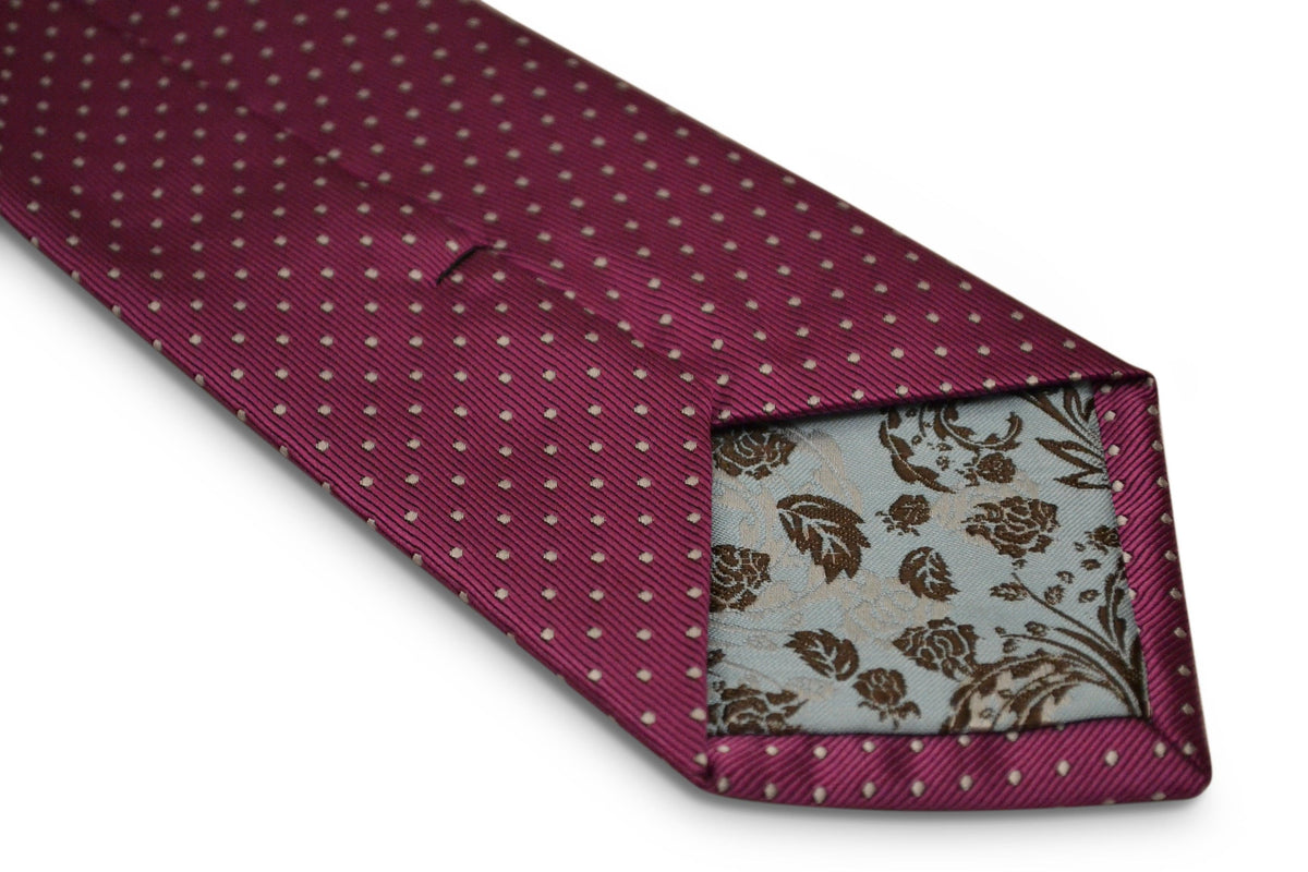 fuschia bright pink with small white pin spot design