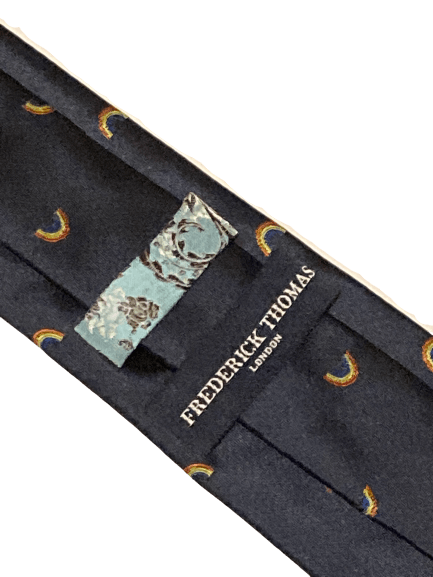 navy tie with embroidered rainbow design