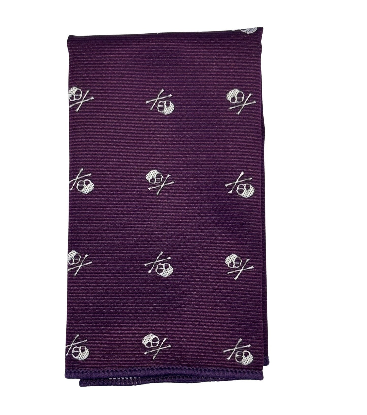 matching purple tie and pocket square with white skull and crossbone design