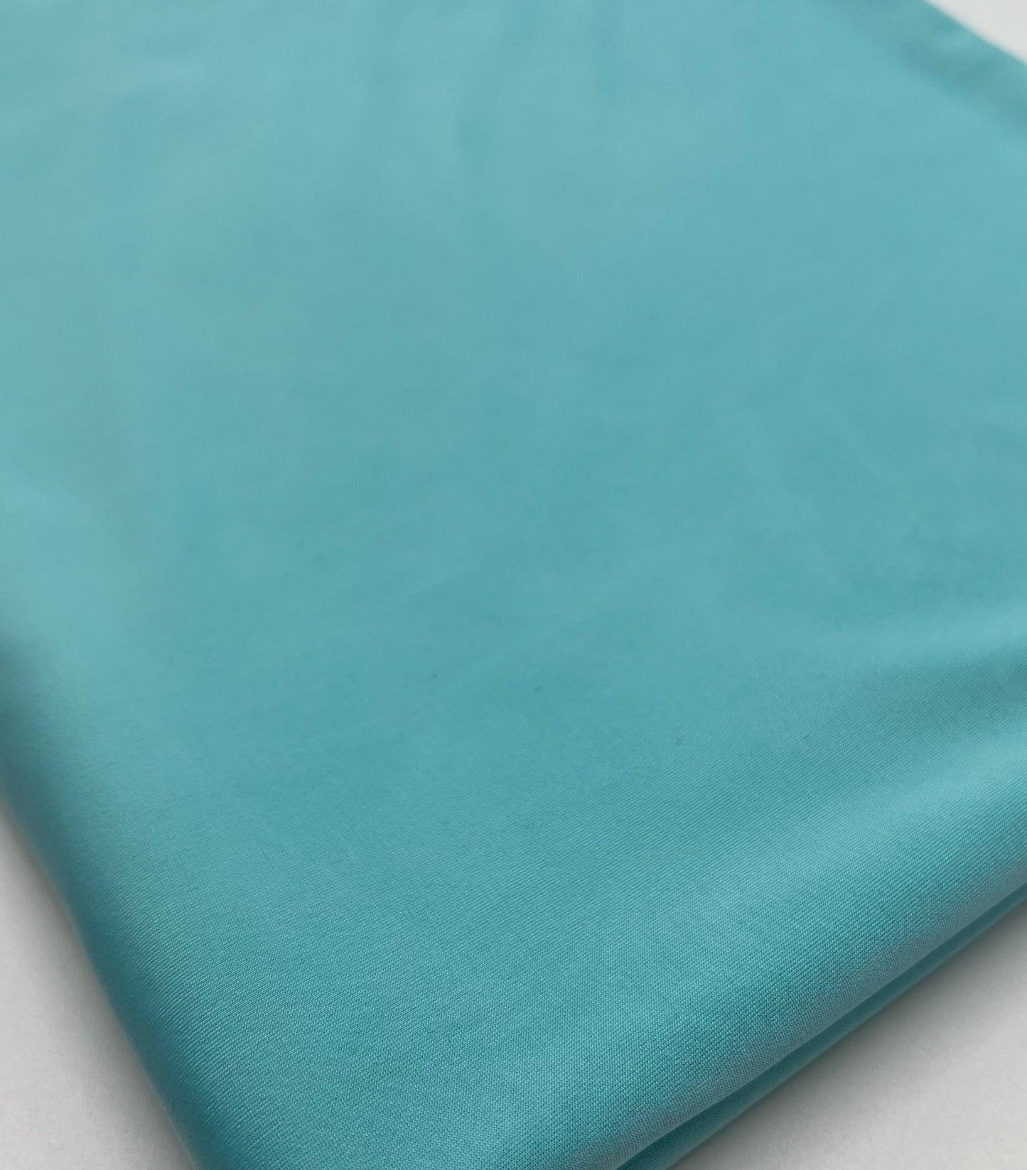Aqua Blue Plain Shiny Soft Touch Slinky 4 Way Stretch Fabric