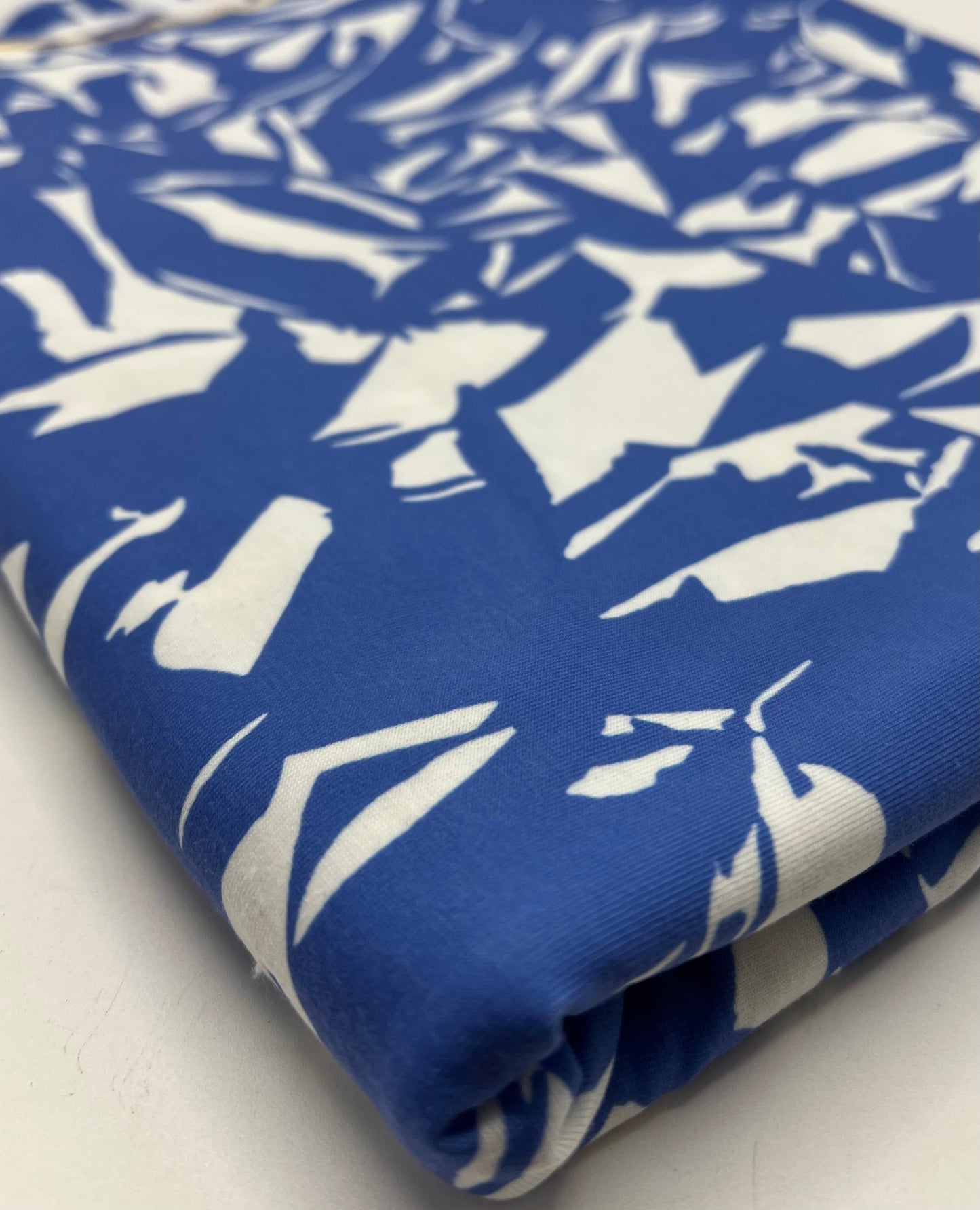 Blue White Mix Print Spun Poly Stretch Fabric
