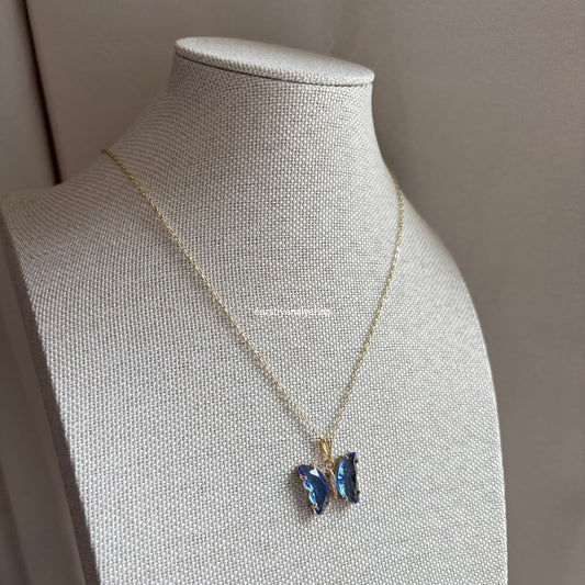 Cool blue crystal glass butterfly gold necklace