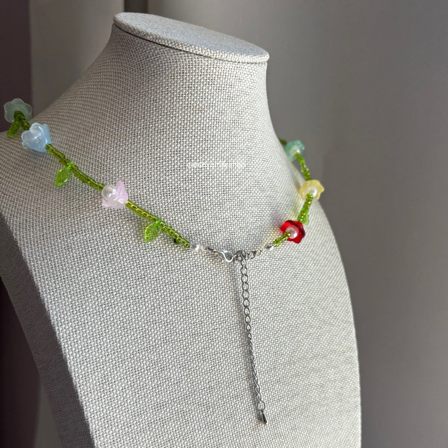 Cool green handmade beaded floral rainbow necklace