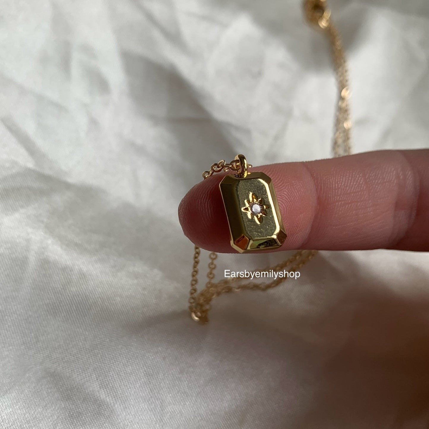 Gold plated rectangle pendant with white crystal diamanté necklace