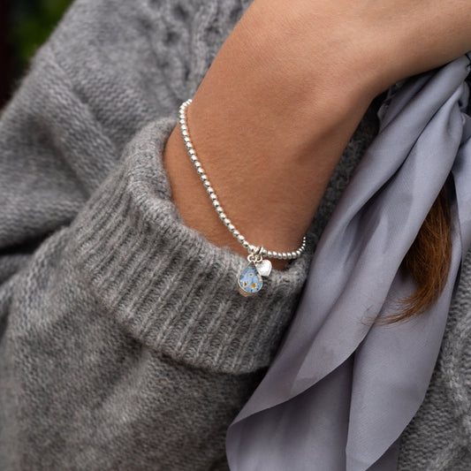 Silver Bead Elasticated Bracelet - Single strand - Real Forget me not hanging charm