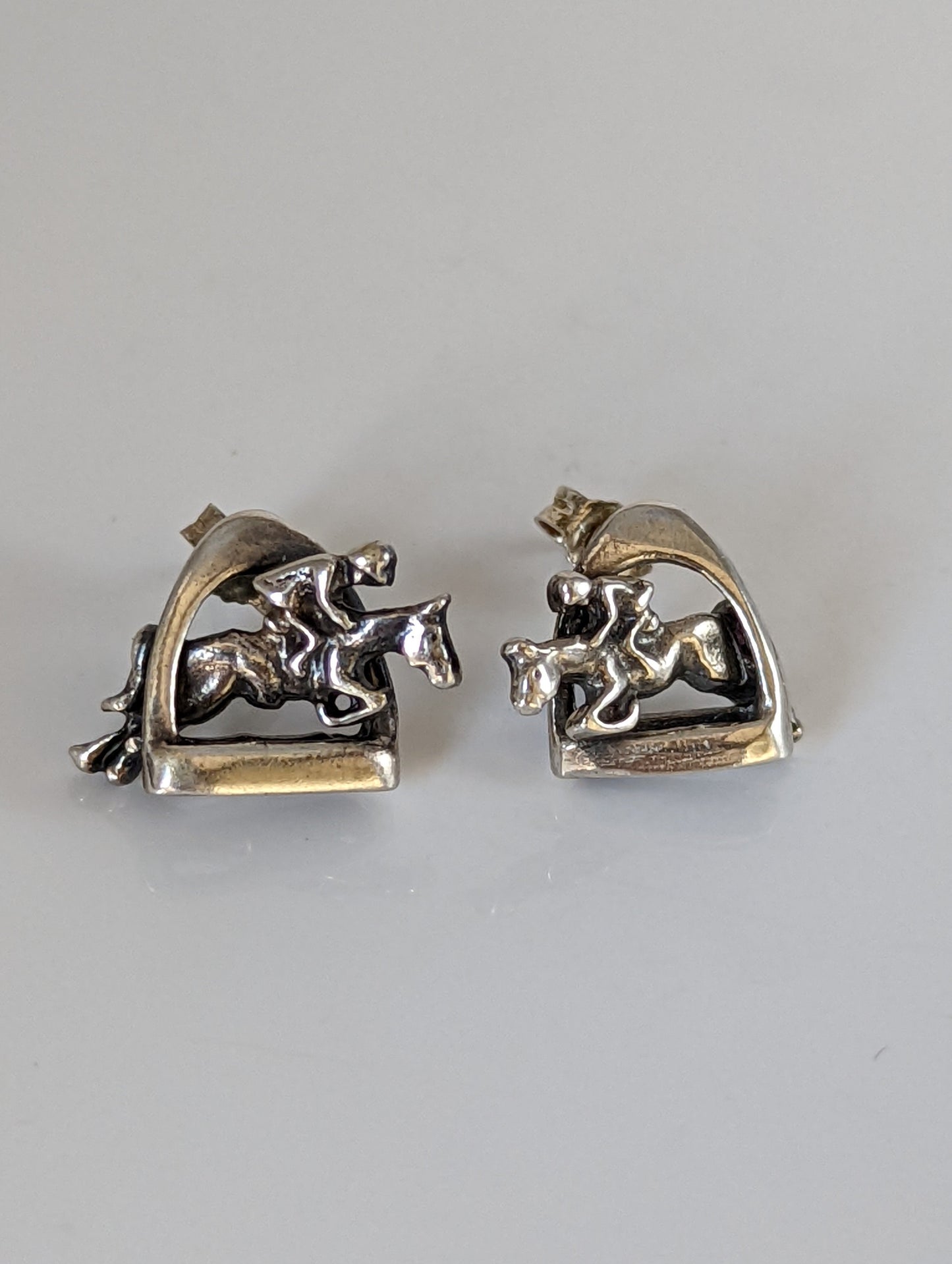 Silver Steed 3D Jump over the Stirrup Stud Earrings