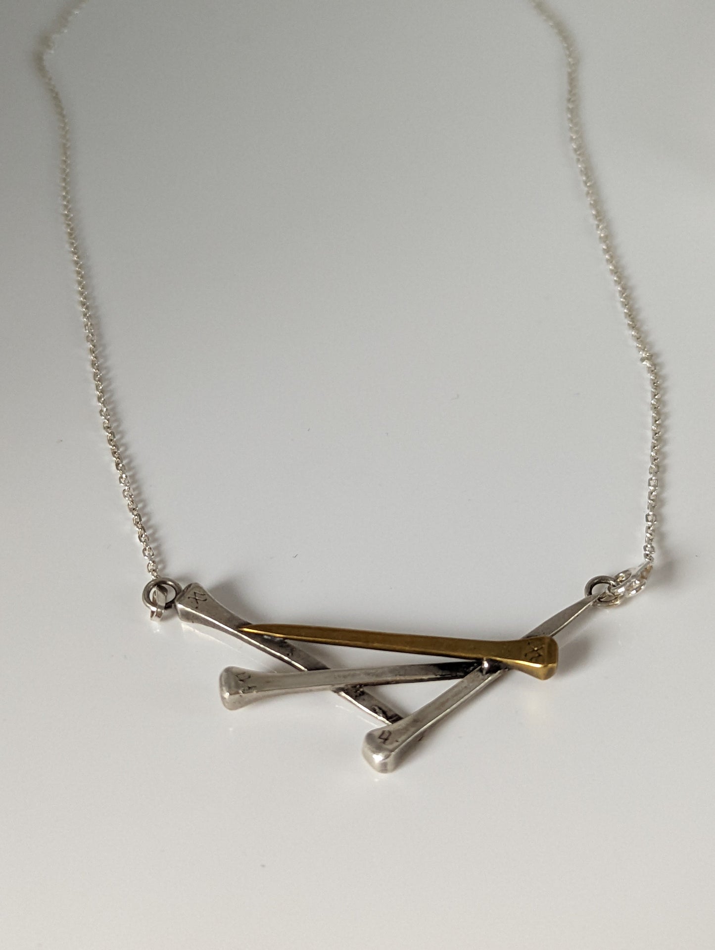 Silver Steed Elegant Hoof Nails Necklace