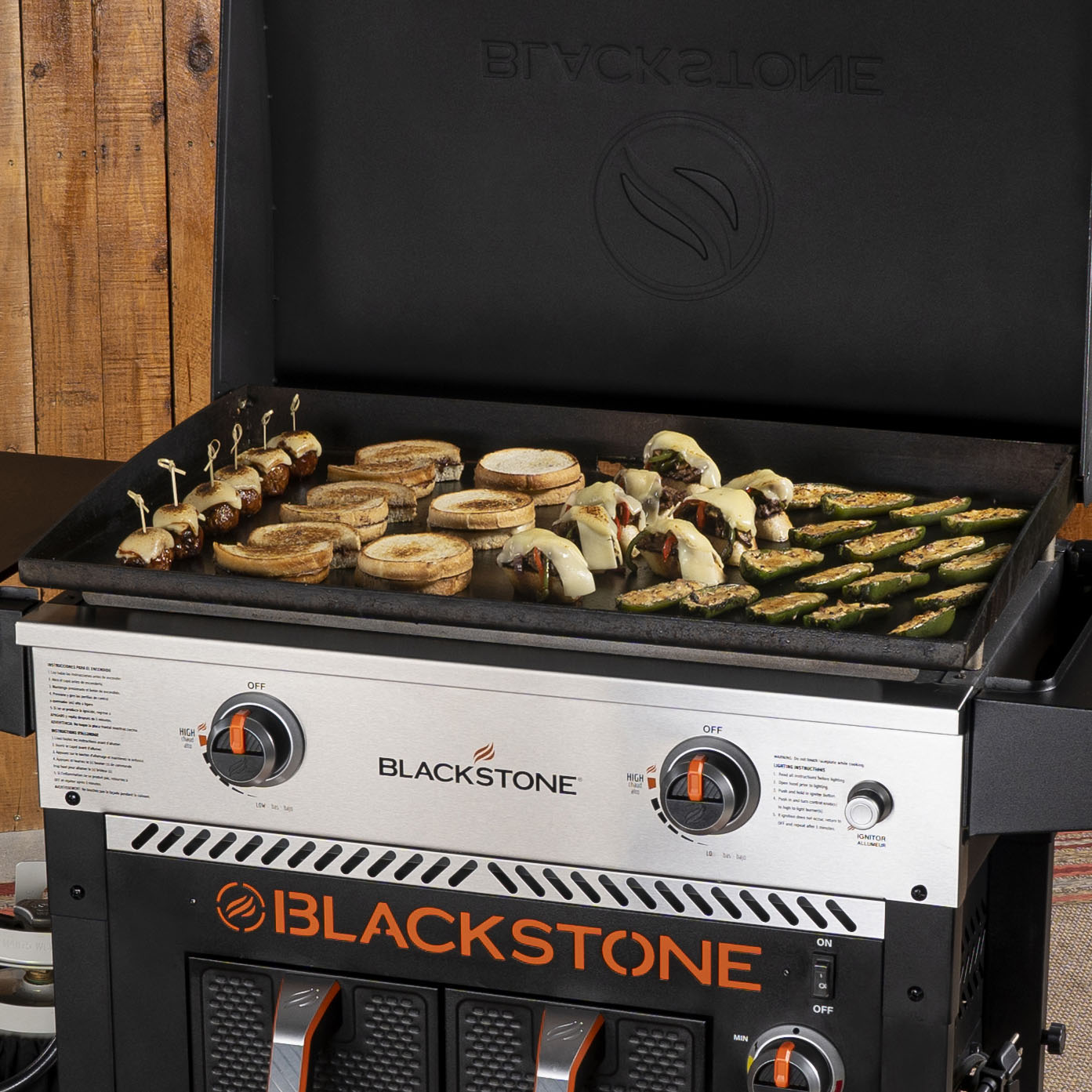 The Foalyard Blackstone 28-inch Gas Griddle Plus AirFryer Combo and Hood - cooking courgettes