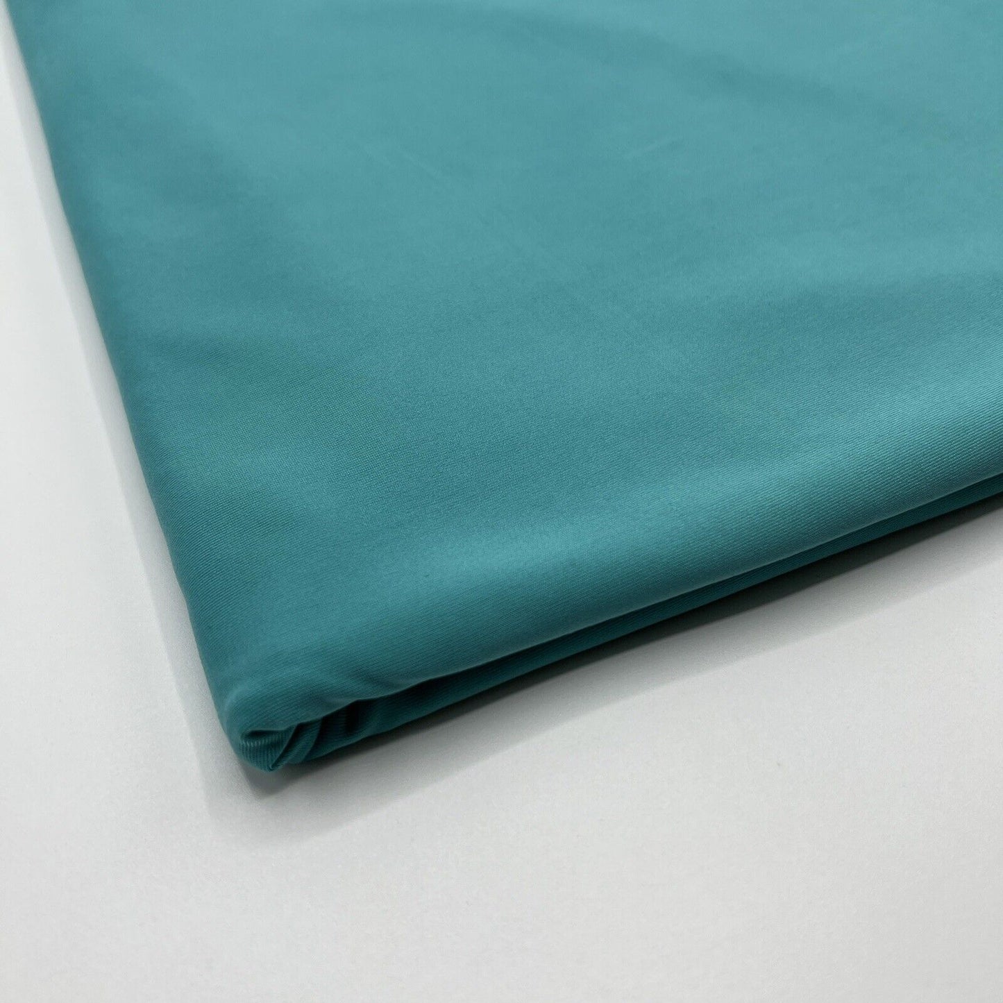 Aqua Blue Plain Shiny Soft Touch Slinky 4 Way Stretch Fabric