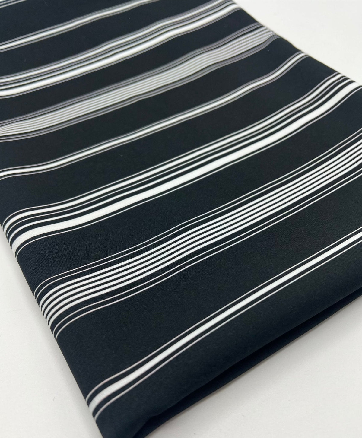 Black Multi Vertical Stripe Lightweight Non Stretch Fabric