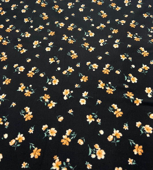 Black Orange Ditsy Floral Print Soft Spun Poly Stretch Fabric