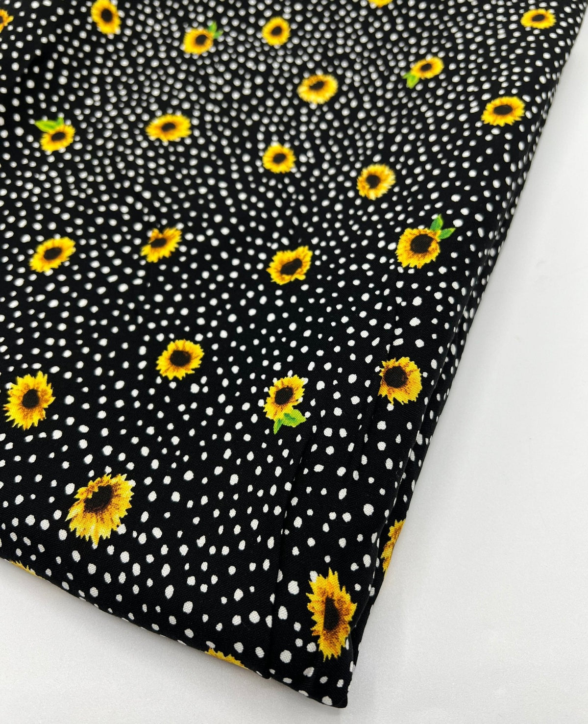 Black Spot Sunflower Lightweight Non Stretch Woven Fabric