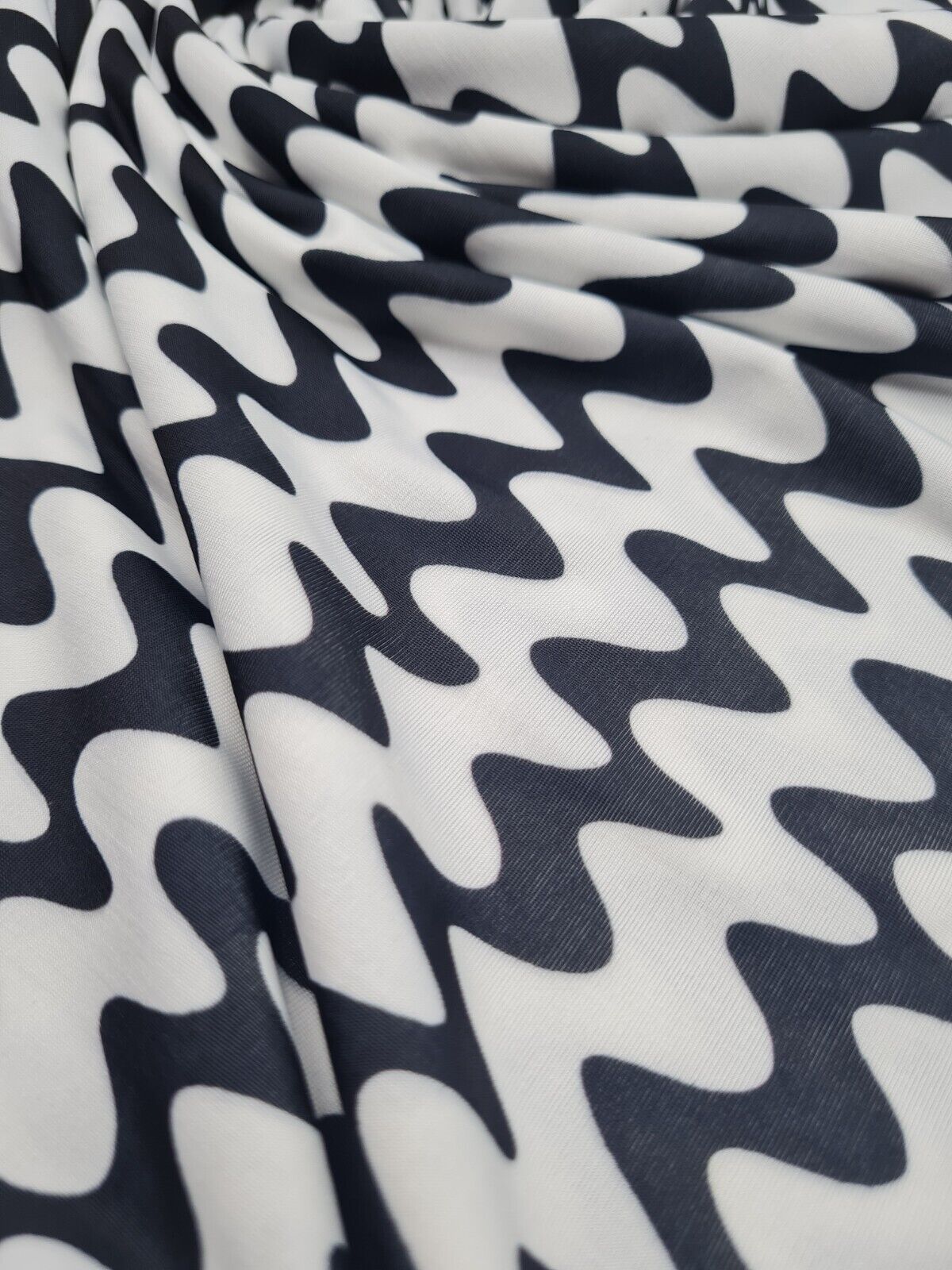 Black Vertical Wiggle Print Soft Touch Stretch Fabric