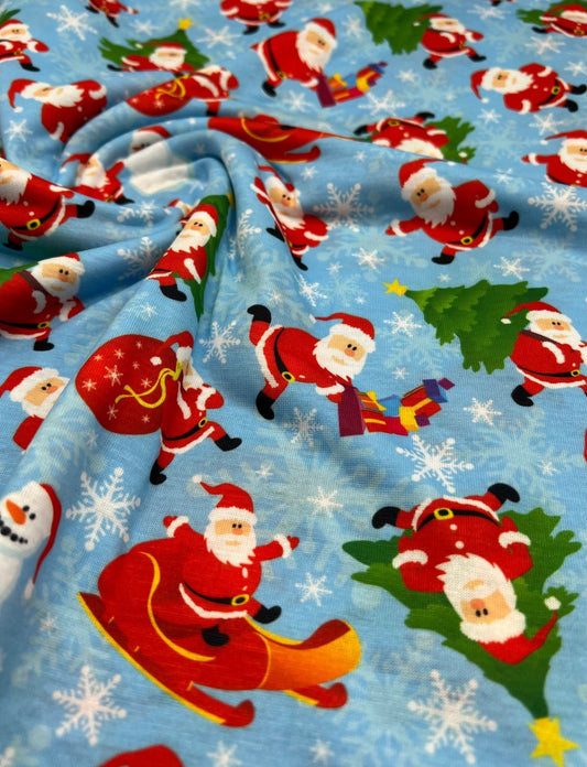 Blue Santa Sledge Print Soft Spun Poly Stretch Fabric