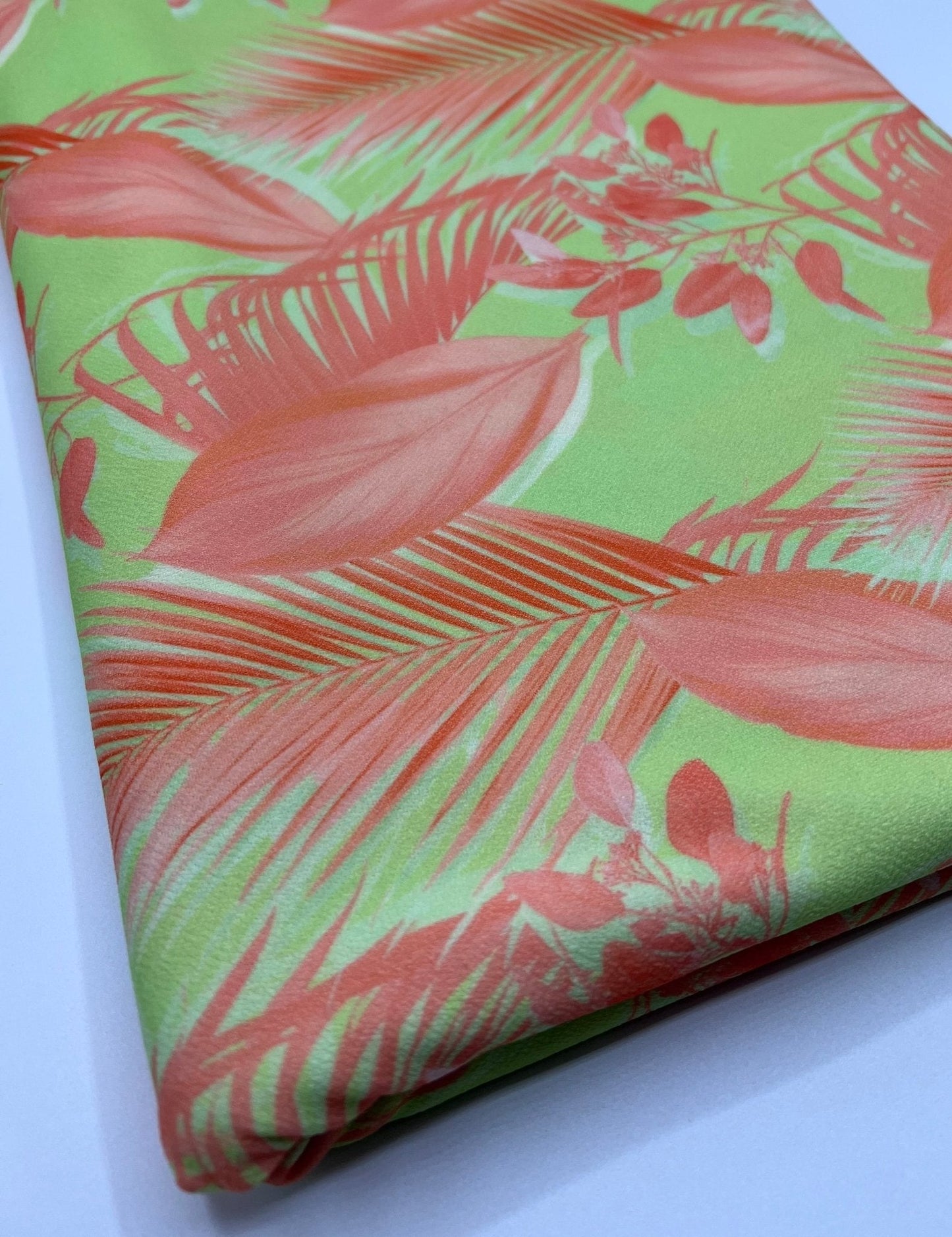Bright Green & Orange Leaf Print Lightweight Jersey Crepe Fabric 4 Way Stretch