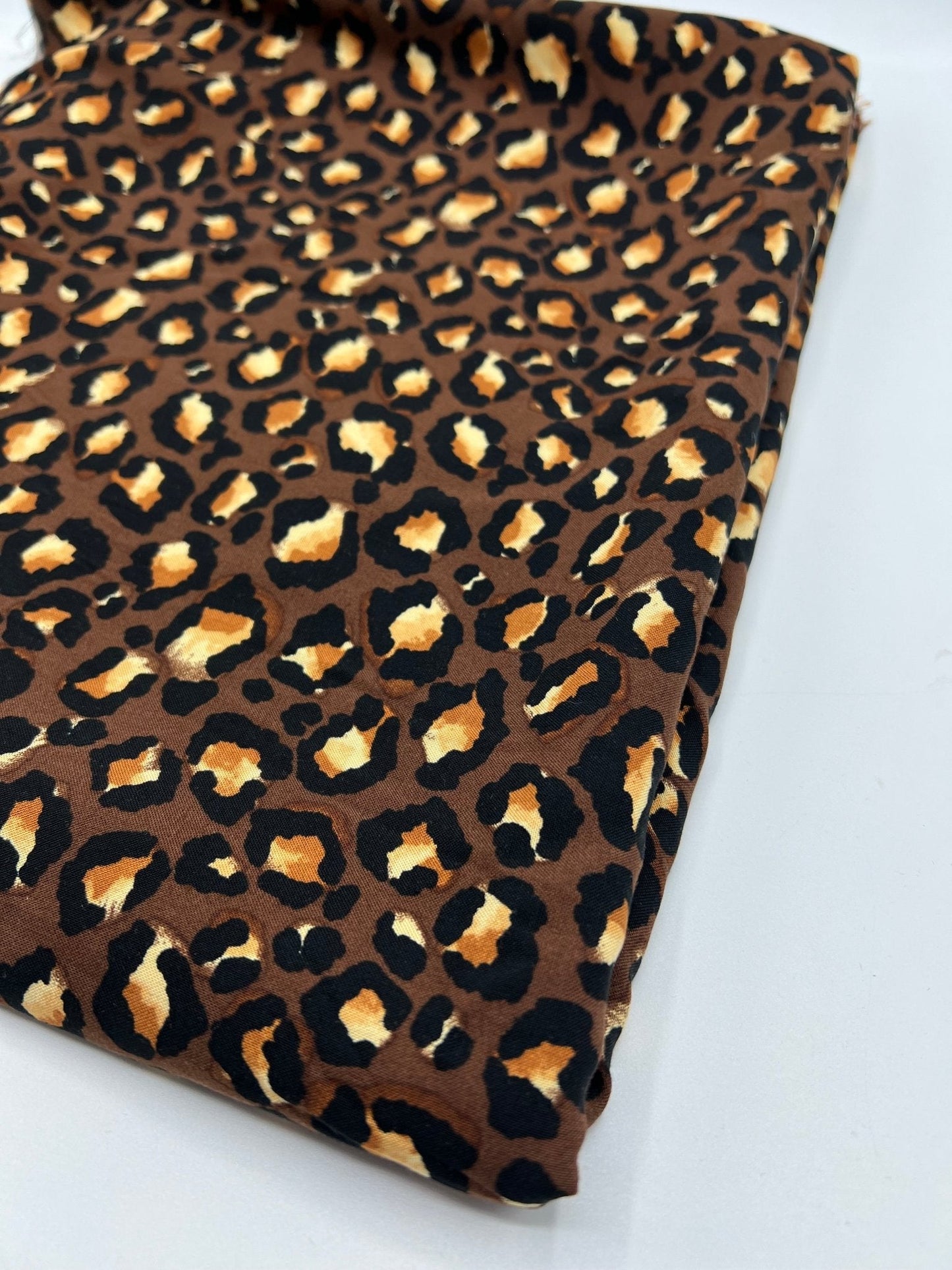 Brown Leopard Animal Lightweight Non Stretch Woven Fabric
