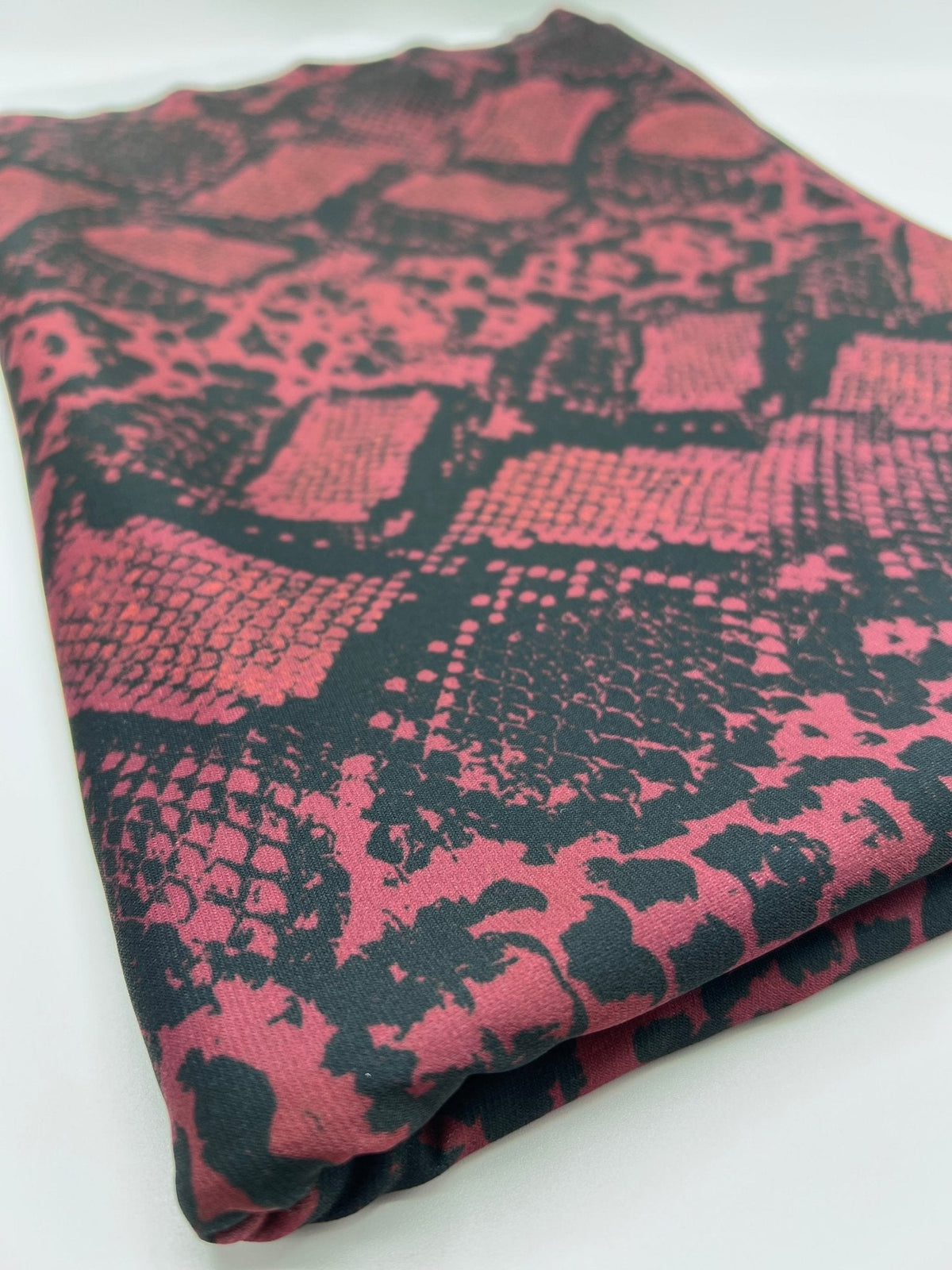 Burgundy Snake Print ITY Fabric