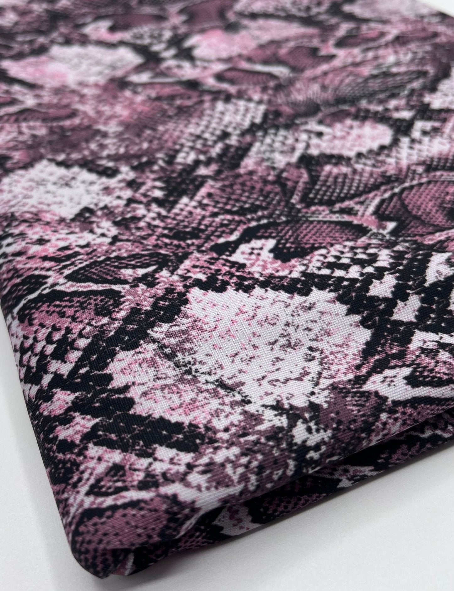 Burgundy Snake Print Soft Touch Stretch Fabric