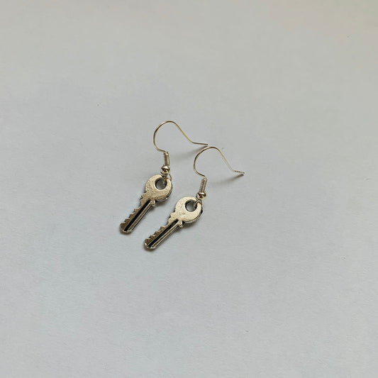 Little silver key dangle earrings