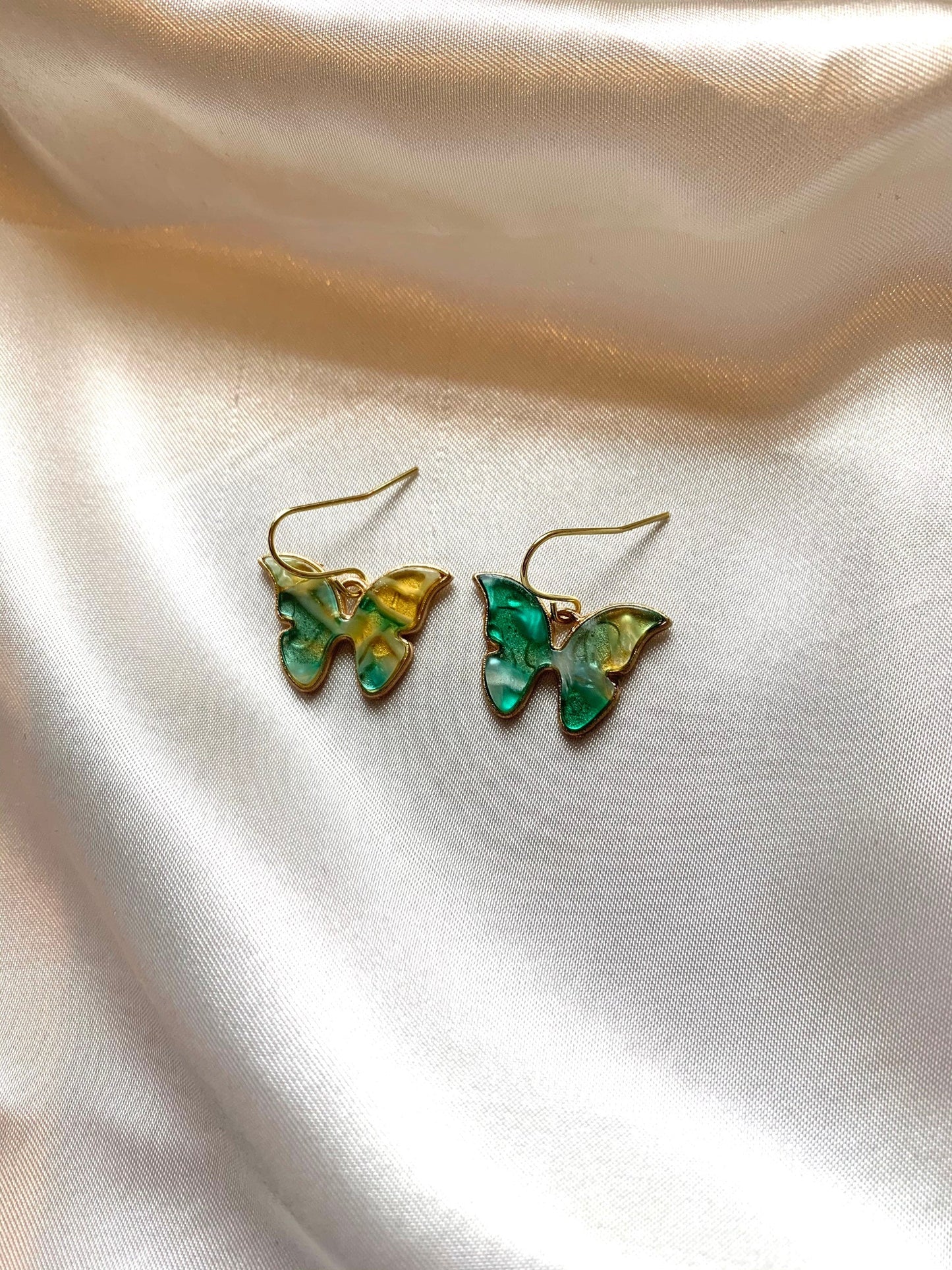 Colourful marble effect gold butterfly earrings
