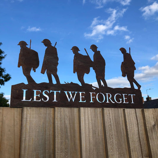 A Rusty Metal Lest We Forget Soldier Scene Garden Decoration