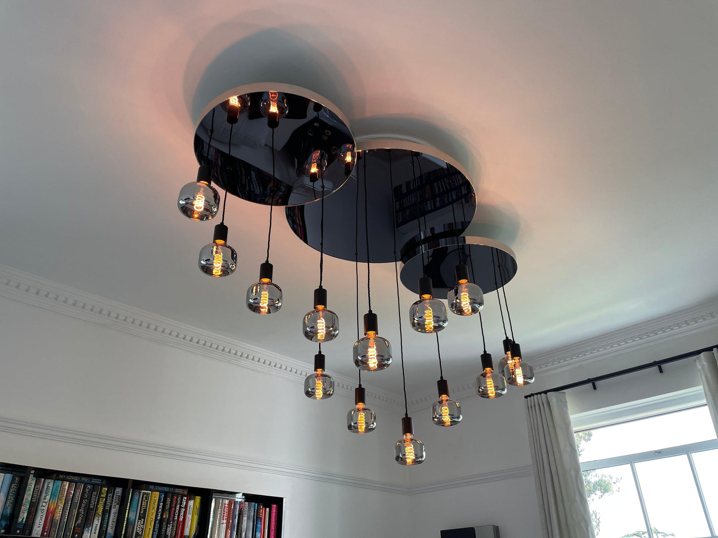 Modern Waves: Stainless Steel Mirrored Chandelier