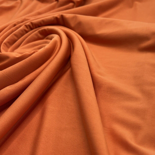 Orange Plain Shiny Soft Touch Slinky 4 Way Stretch Fabric