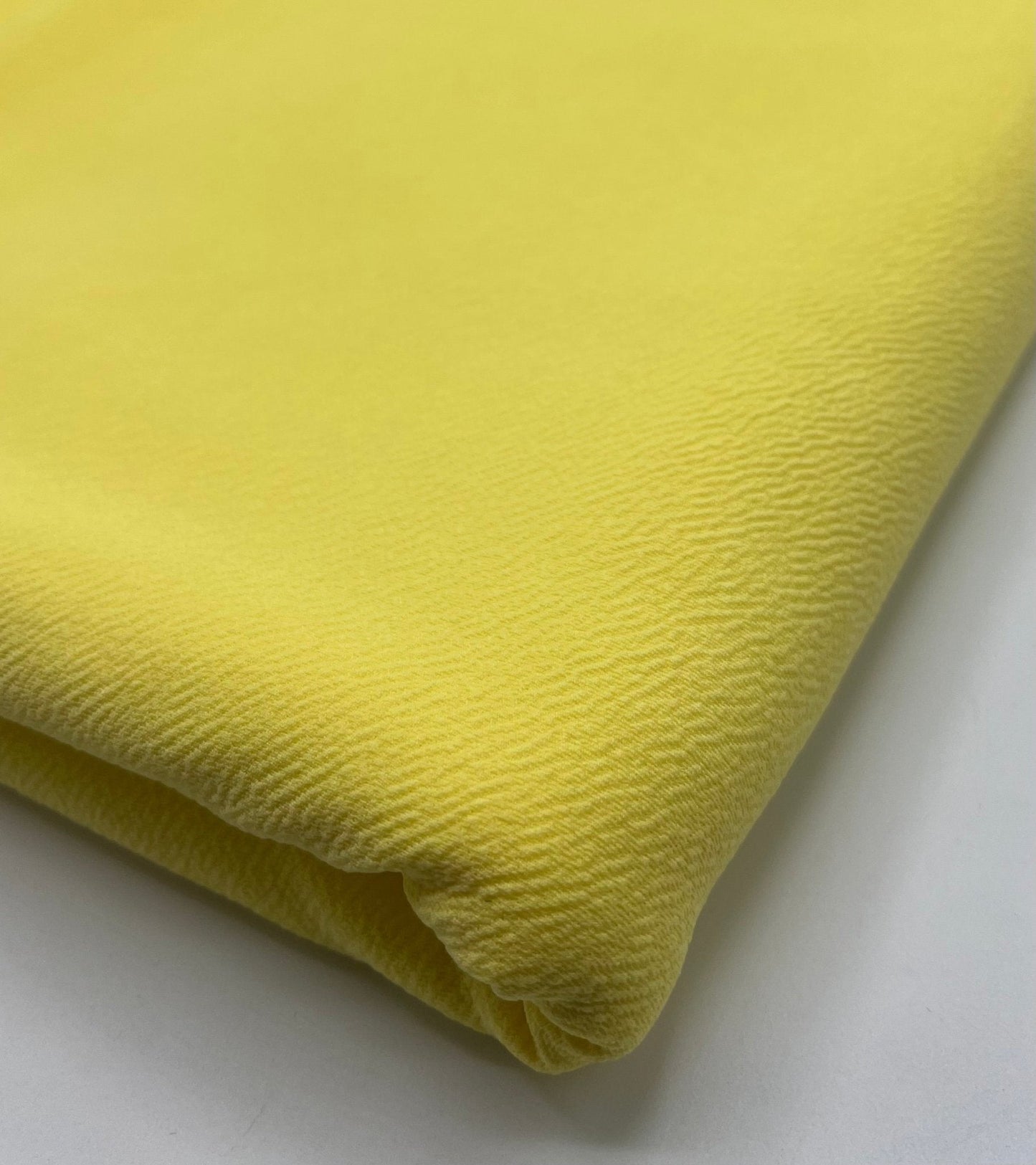 Plain Pastel Yellow Liverpool Bullet Stretch Fabric