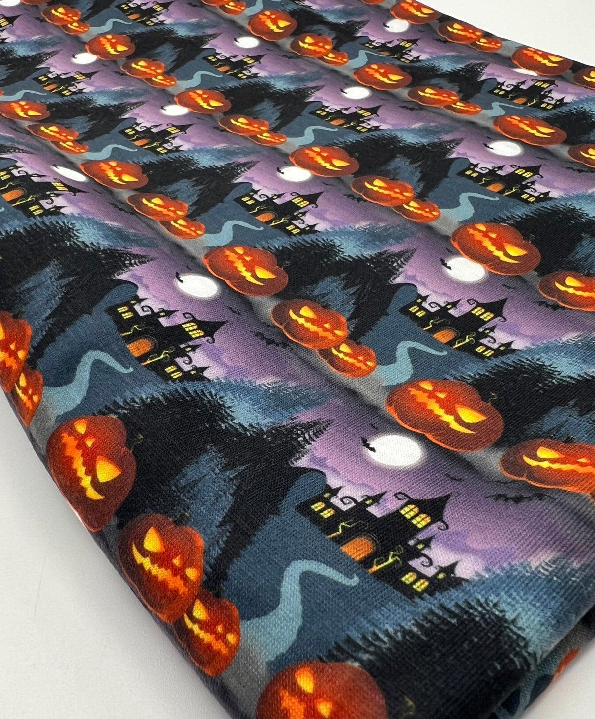 Purple Pumpkin Castle Halloween Print Spun Poly Stretch Fabric