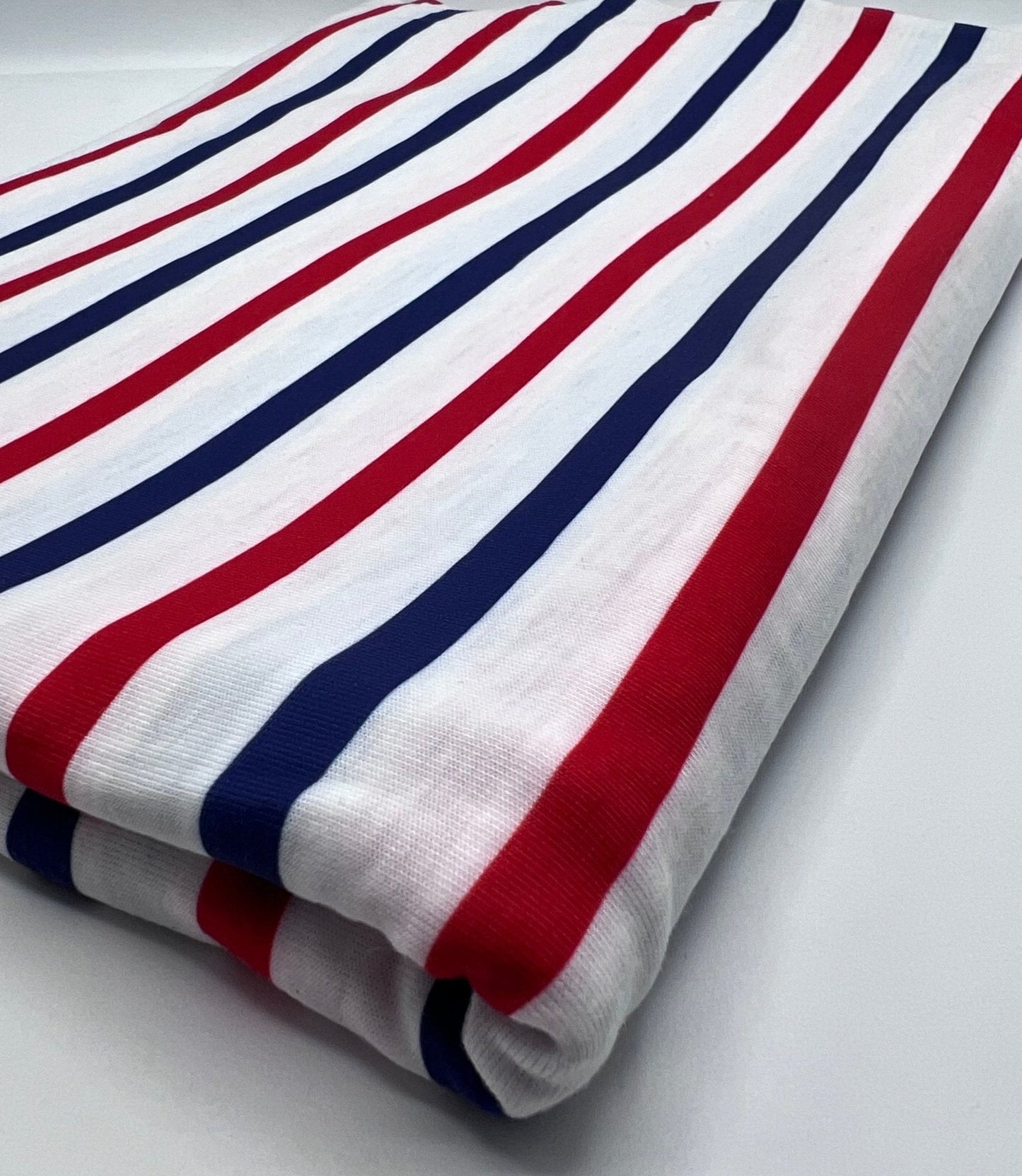Red Navy Stripe Print Spun Poly Stretch Fabric