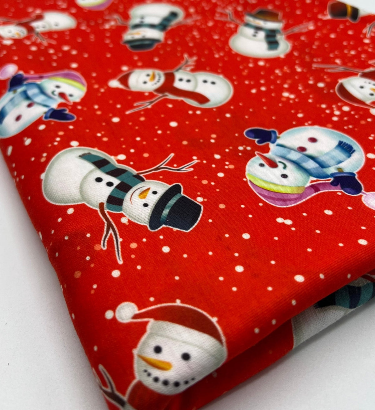 Red Snow Snowman Print Soft Spun Poly Stretch Fabric