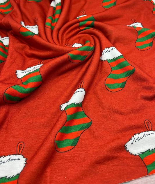 Red Stocking Print Soft Spun Poly Stretch Fabric