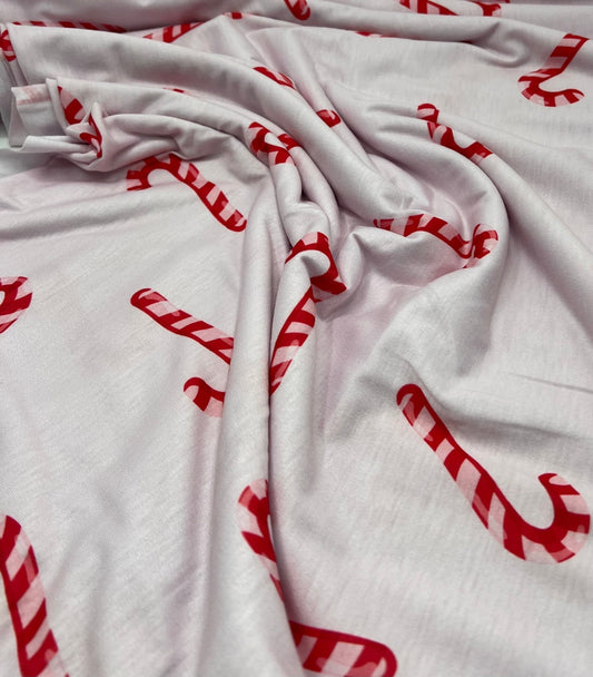 Soft Pink Candy Cane Print Soft Spun Poly Stretch Fabric