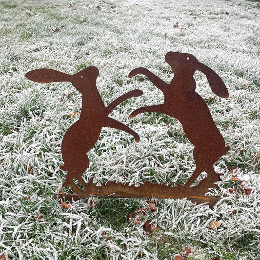 PoppyForge Large Boxing Hares On Grass