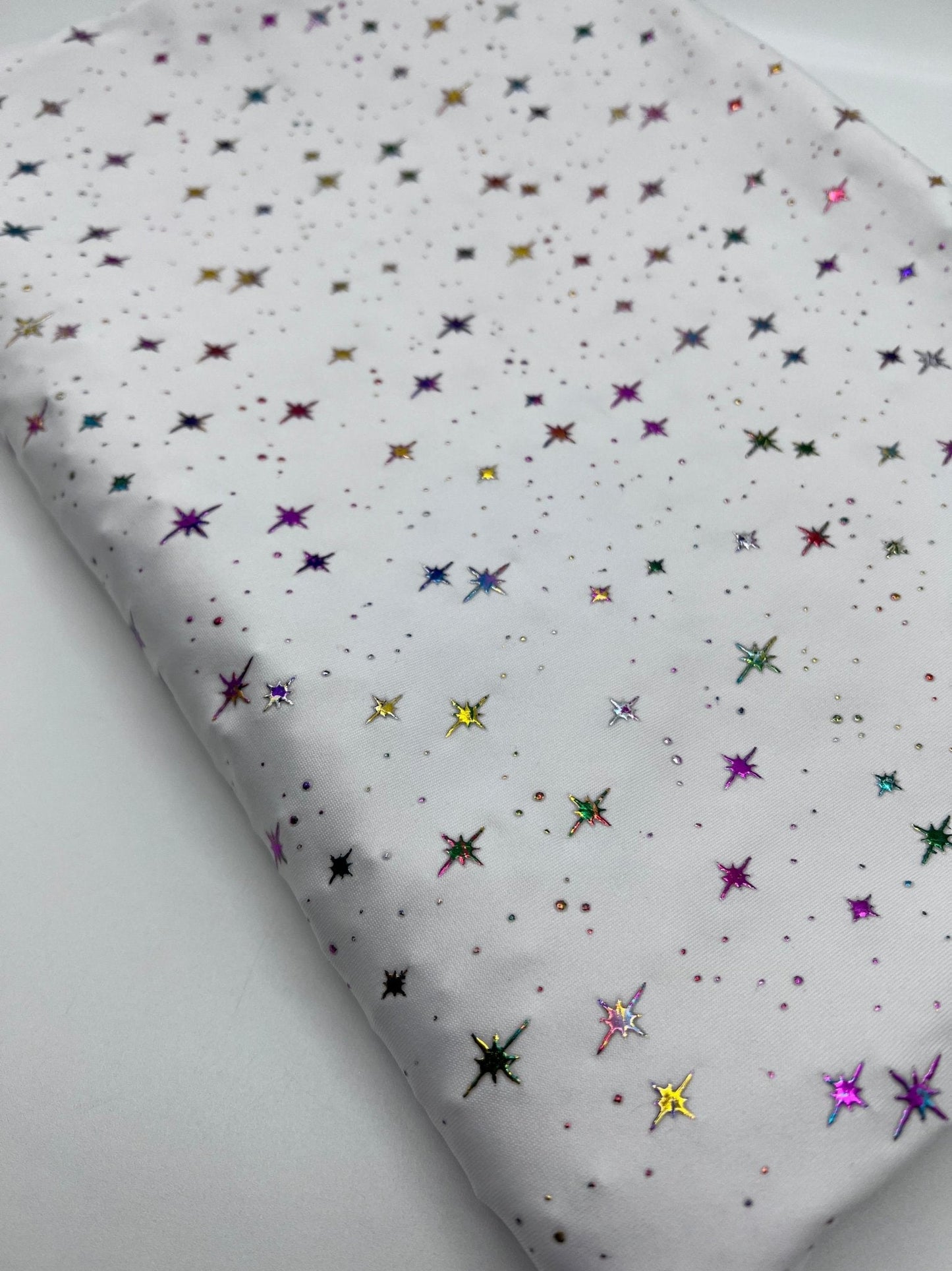 White Multi Star Soft Spun Poly Stretch Fabric