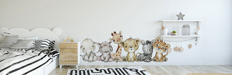 ClickWalls safari animal wall stickers featuring an elephant, hippo, giraffe, lion, zebra and leopard decorating a children's bedroom.