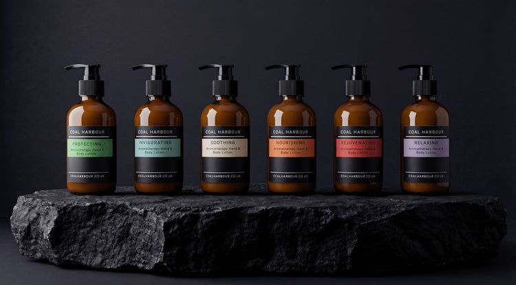 Coal Harbour aromatherapy hand and body lotions in amber pump bottles