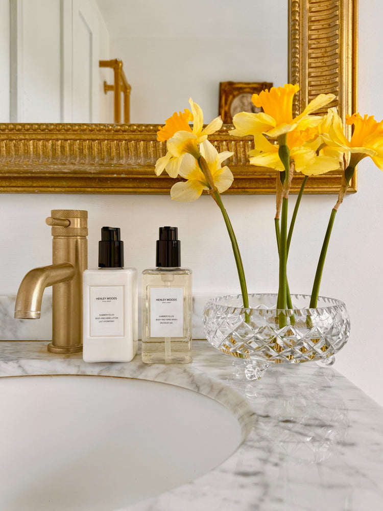 Henley Woods Summer Fields body and hand wash and lotion with yellow daffodils