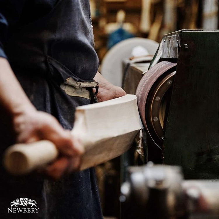 Newbery Cricket craftsman shaping a handcrafted English willow cricket bat