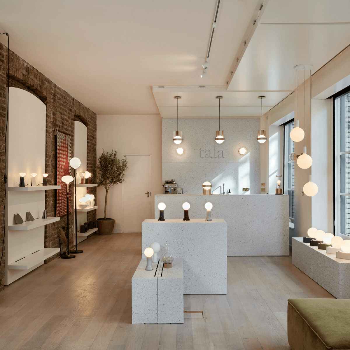 Tala lighting showroom featuring pendant, table and floor lights