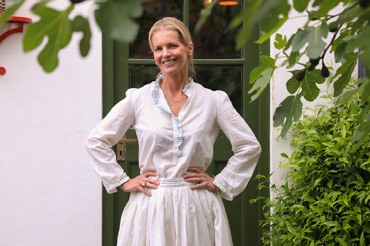Woman wearing white Woven London handloom clothing outdoors