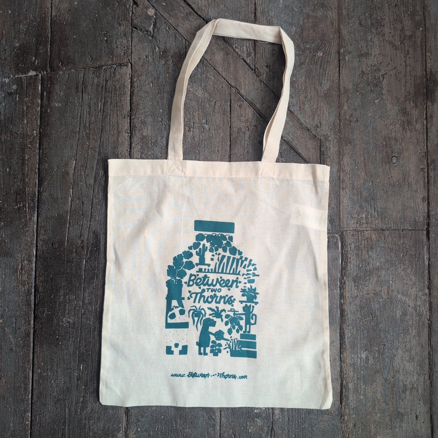 Between Two Thorns Cotton Tote Bag