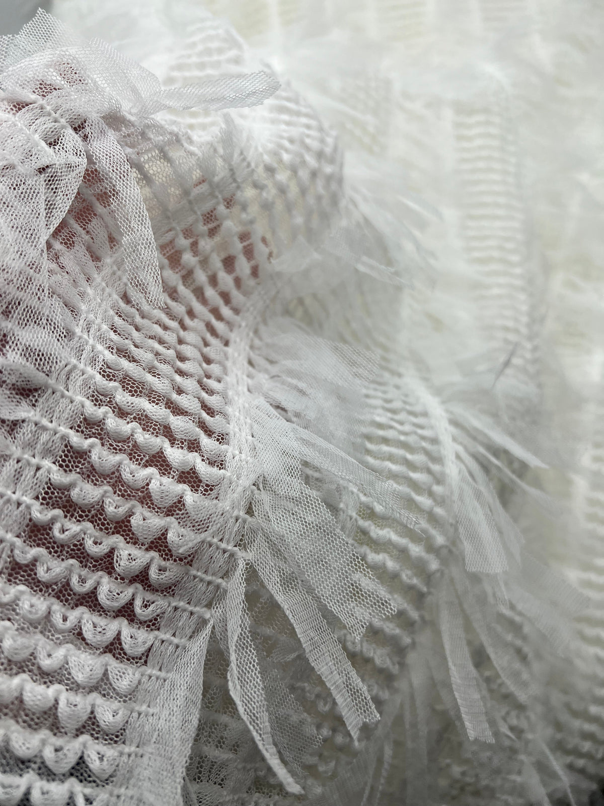 White Textured Mesh Tassel Fabric 2 Way Stretch