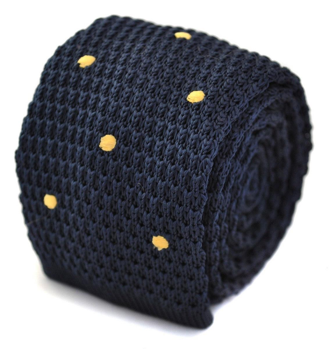 navy blue skinny knitted tie with gold polka dots