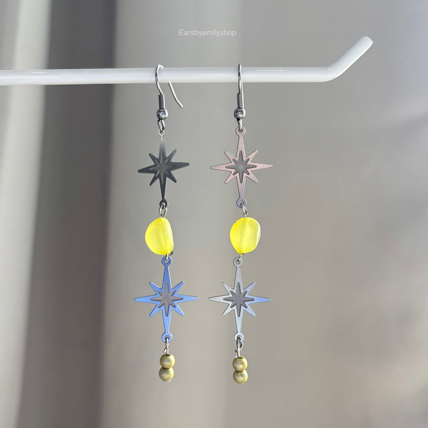 Stainless steel star and yellow bead statement dangle earrings