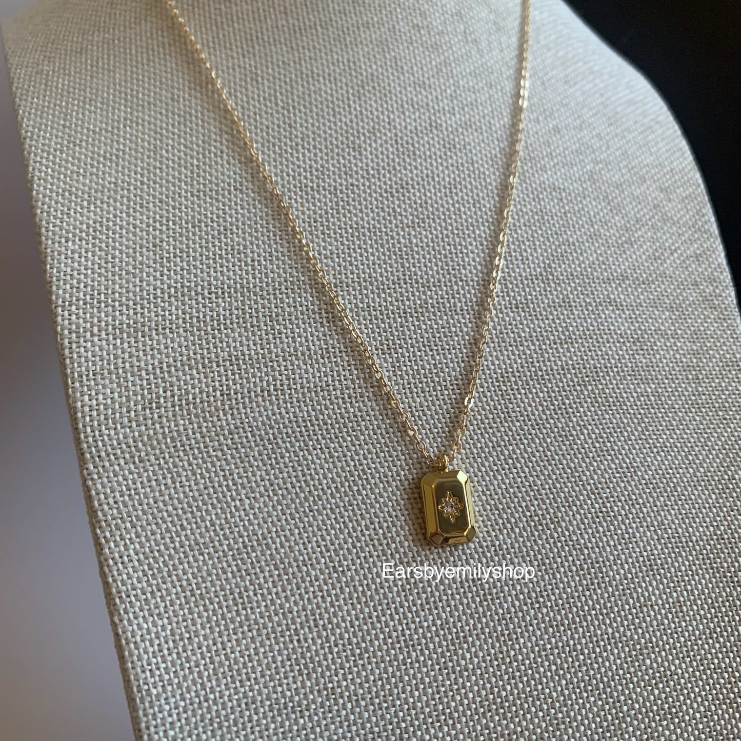 Gold plated rectangle pendant with white crystal diamanté necklace