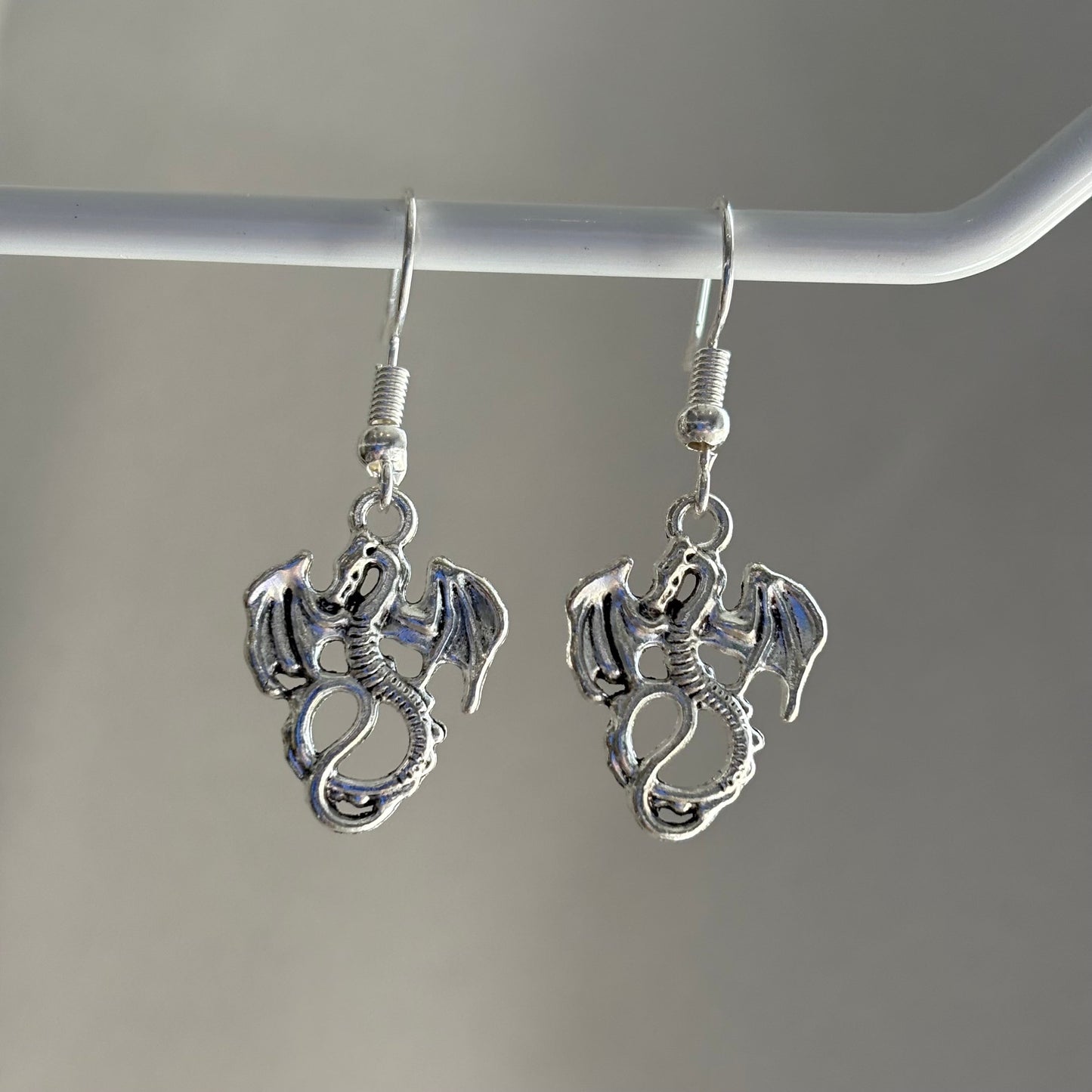 Silver little dragon dangle earrings