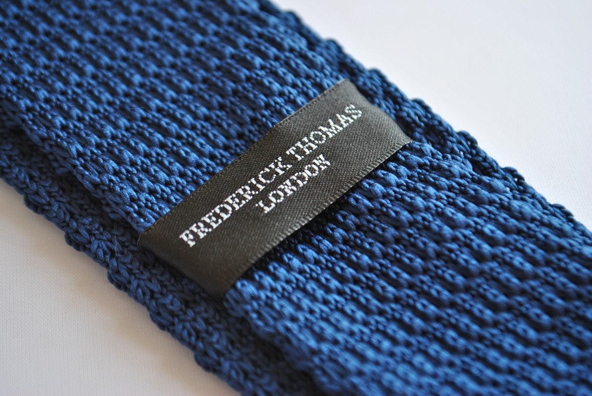 navy blue skinny knitted tie with hot pink tip
